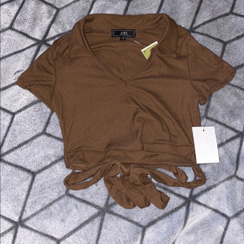 Brown crop top wrap around waist.